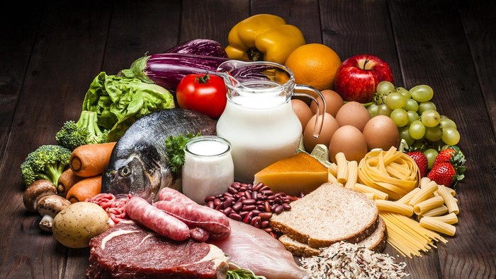 healthy eating and diet concept - natural rich in protein food on table