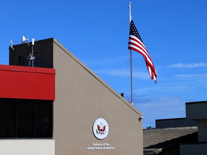 The national flag hangs above the US embassy building in Honiara, Solomon Islands on February 2, 2023. - The United States reopened its embassy in the Solomon Islands on February 2 after a 30-year hiatus, part of a bid to counter Chinas growing influence in the South Pacific. (Photo by Charley PIRINGI / AFP)