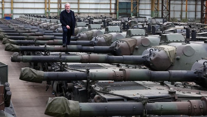 Dozens of German-made Leopard 1 tanks and other armoured vehicles, owned by Freddy Versluys the CEO of Belgian defence company OIP Land Systems, who said could help Ukraine if he received export permits from the Belgian regional government of Wallonia and from Germany to sell them, are seen in a hangar in Tournais, Belgium January 31, 2023.  REUTERS/Yves Herman     TPX IMAGES OF THE DAY