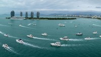Pemandangan udara puluhan kapal pesiar berlayar di Sanya, Provinsi Hainan, China, Kamis (2/2/2023).  
