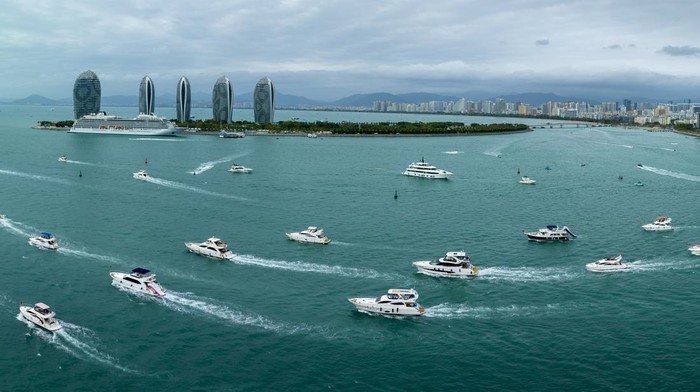 SANYA, CHINA - FEBRUARY 02: Aerial view of tourists enjoying the luxury yacht tour on February 2, 2023 in Sanya, Hainan Province of China. (Photo by VCG/VCG via Getty Images)