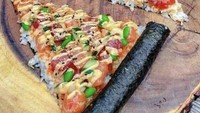 Mencoba gaya fusion food, netizen ini melakukan aksi jahil dengan menggabungkan sushi dan pizza. Sushi ini benar-benar disusun menyerupai potongan pizza segitiga. Foto: Bored Panda