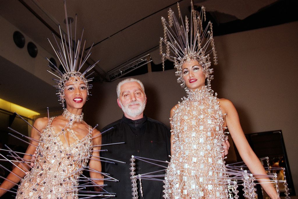 Fashion designer Paco Rabanne poses with models during the Paco Rabanne Haute Couture Spring/Summer 1996 show as part of Paris Fashion Week on January 24, 1996 in Paris, France.(Photo by Stephane Cardinale/Sygma via Getty Images)