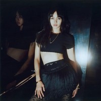 Personel asal Thailand itu pun memakai satu set koleksi Victoria Beckham. Mulai dari cropped top shirt seharga $190 atau Rp 2,8 jutaan, dengan perpaduan rok dan stocking. Foto: dok. Madame Figaro