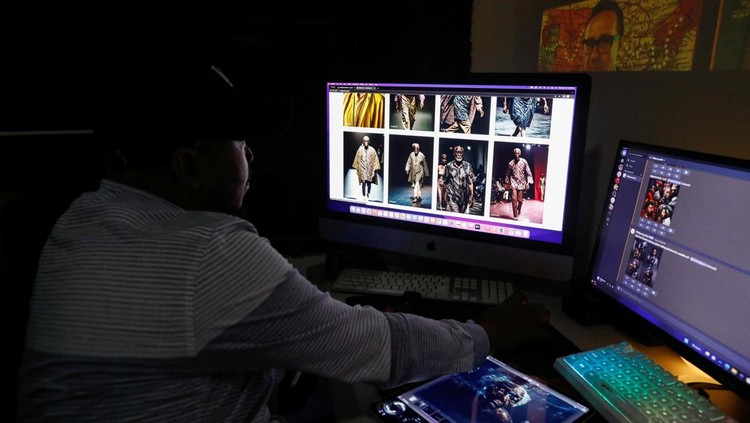 Nigerian artist Malik Afegbua creates hyper-realistic pictures of African elderly people, using artificial intelligence, at his home in Lagos, Nigeria January 25, 2023. REUTERS/Temilade Adelaja