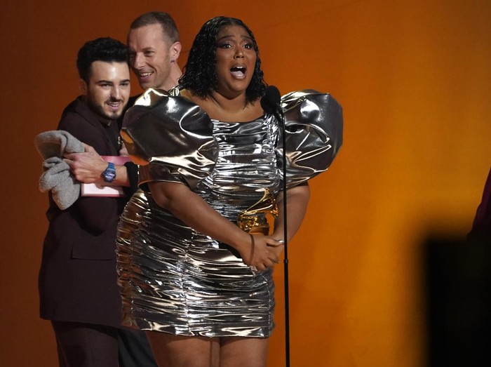 Lizzo accepts the award for record of the year for About Damn Time at the 65th annual Grammy Awards on Sunday, Feb. 5, 2023, in Los Angeles. (AP Photo/Chris Pizzello)