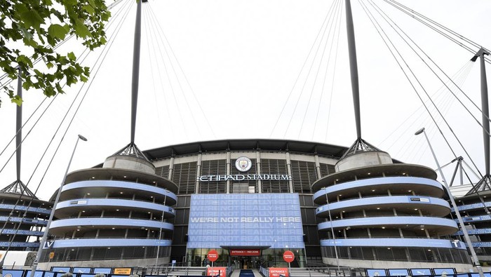 FILE - A exterior shot of the stadium before the English Premier League soccer match between Manchester City and Arsenal at the Etihad Stadium in Manchester, England, Wednesday, June 17, 2020. Manchester City has been accused of numerous breaches of the Premier Leagues financial regulations between 2009-18. The period covers the first nine full seasons under the club’s Abu Dhabi ownership. City won the league on three occasions during that time in 2012, 2014 and 2018. (Peter Powell/Pool via AP, File)