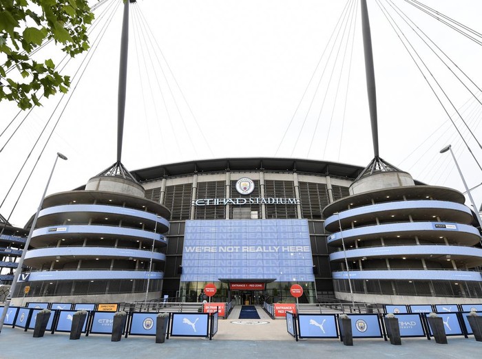 FILE - A exterior shot of the stadium before the English Premier League soccer match between Manchester City and Arsenal at the Etihad Stadium in Manchester, England, Wednesday, June 17, 2020. Manchester City has been accused of numerous breaches of the Premier Leagues financial regulations between 2009-18. The period covers the first nine full seasons under the club’s Abu Dhabi ownership. City won the league on three occasions during that time in 2012, 2014 and 2018. (Peter Powell/Pool via AP, File)