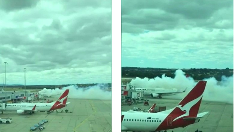 Pesawat Qantas di kelilingi kepulan asap Pesawat Qantas di kelilingi kepulan asap