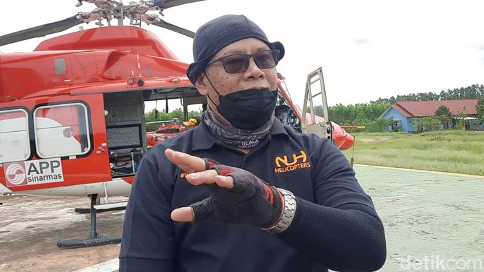 Heru, pilot helikoter water boombing yang pilih pensiun dini sebagai prajurit TNI.