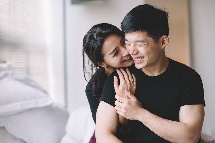 asian chinese couple hugging and bonding time