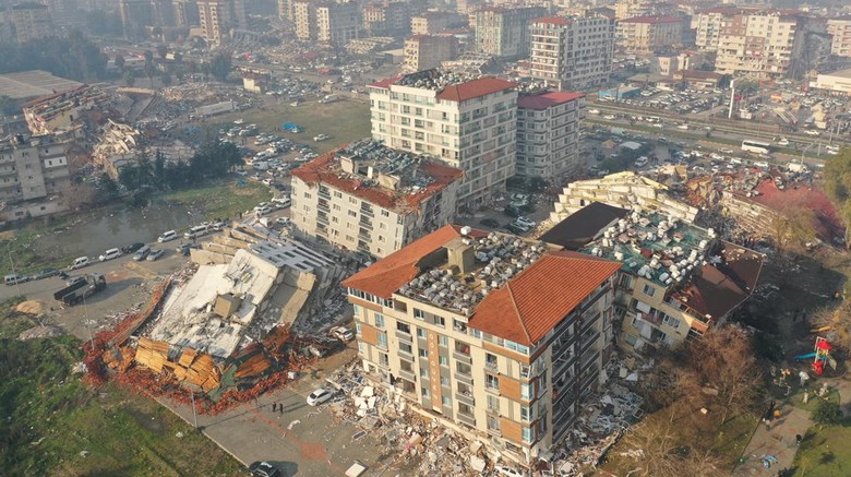 An aerial view shows collapsed and damaged buildings following an earthquake in Hatay, Turkey February 7, 2023. REUTERS/Umit Bektas