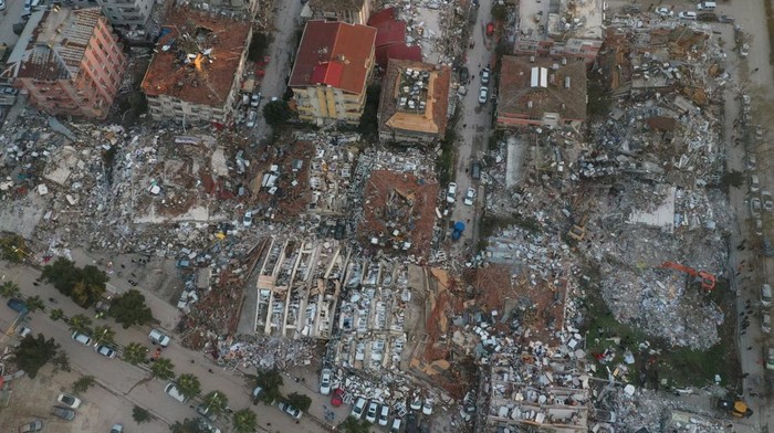 An aerial view shows collapsed and damaged buildings following an earthquake in Hatay, Turkey February 7, 2023. REUTERS/Umit Bektas