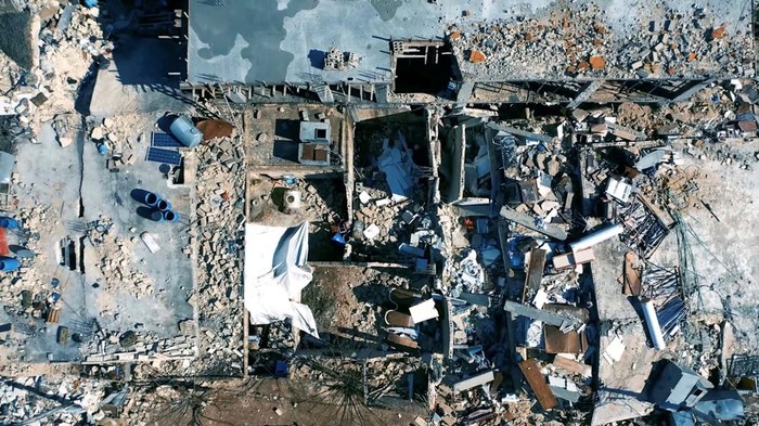 A damaged building is seen in the aftermath of the earthquake, in Aleppo, Syria February 7, 2023, in this screen grab taken from a social media video. White Helmets/Handout via REUTERS  THIS IMAGE HAS BEEN SUPPLIED BY A THIRD PARTY.  NO RESALES. NO ARCHIVES