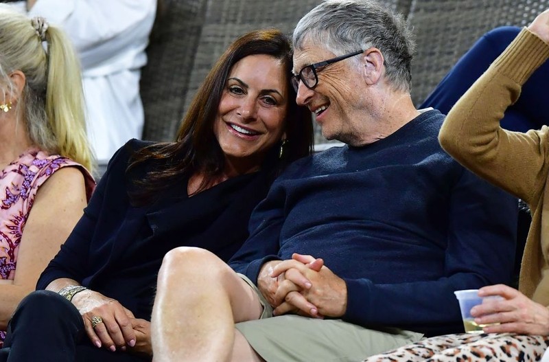 US businessman Bill Gates (R) attends the tennis match between Paula Badosa of Spain and Maria Sakkari of Greece during their WTA semifinal match at the Indian Wells tennis tournament on March 18, 2022 in Indian Wells, California. (Photo by Frederic J. BROWN / AFP) (Photo by FREDERIC J. BROWN/AFP via Getty Images)