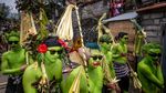 Kemeriahan Tradisi Mewarnai Diri Untuk Usir Roh Jahat di Bali