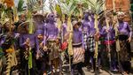 Kemeriahan Tradisi Mewarnai Diri Untuk Usir Roh Jahat di Bali
