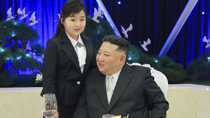 In this photo provided by the North Korean government, North Korean leader Kim Jong Un, center left, with his daughter attends a military parade to mark the 75th founding anniversary of the Korean People’s Army on Kim Il Sung Square in Pyongyang, North Korea Wednesday, Feb. 8, 2023. Independent journalists were not given access to cover the event depicted in this image distributed by the North Korean government. The content of this image is as provided and cannot be independently verified. Korean language watermark on image as provided by source reads: 