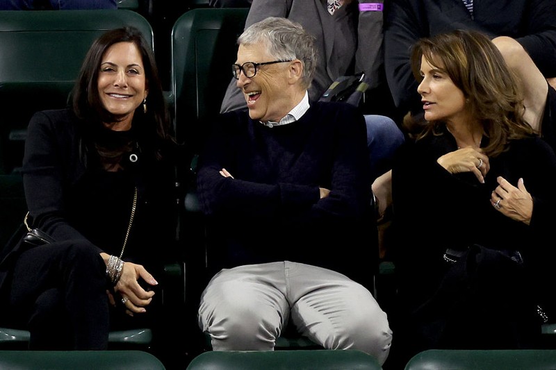 US businessman Bill Gates (2nd L) attends the tennis match between Paula Badosa of Spain and Maria Sakkari of Greece during their WTA semifinal match at the Indian Wells tennis tournament on March 18, 2022 in Indian Wells, California. (Photo by Frederic J. BROWN / AFP) (Photo by FREDERIC J. BROWN/AFP via Getty Images)