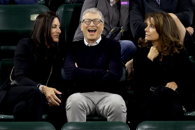 US businessman Bill Gates (2nd L) attends the tennis match between Paula Badosa of Spain and Maria Sakkari of Greece during their WTA semifinal match at the Indian Wells tennis tournament on March 18, 2022 in Indian Wells, California. (Photo by Frederic J. BROWN / AFP) (Photo by FREDERIC J. BROWN/AFP via Getty Images)