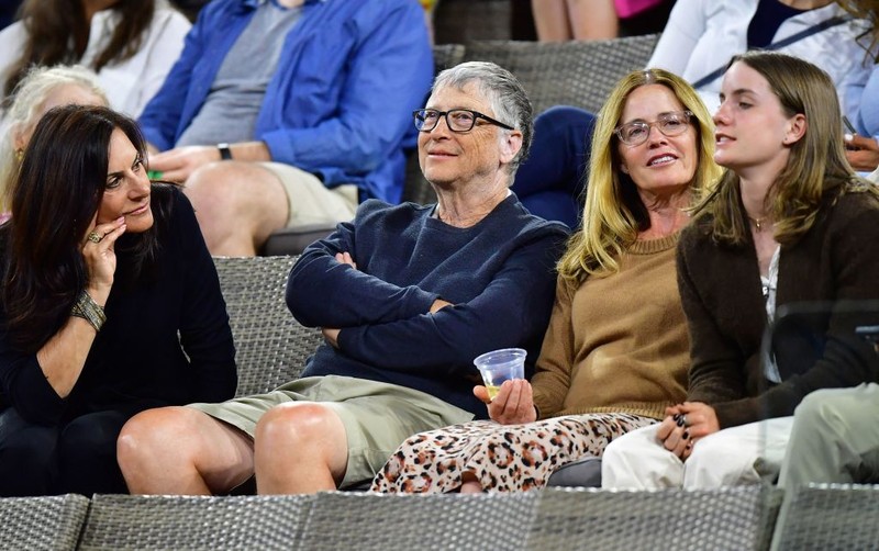 US businessman Bill Gates (2nd L) attends the tennis match between Paula Badosa of Spain and Maria Sakkari of Greece during their WTA semifinal match at the Indian Wells tennis tournament on March 18, 2022 in Indian Wells, California. (Photo by Frederic J. BROWN / AFP) (Photo by FREDERIC J. BROWN/AFP via Getty Images)