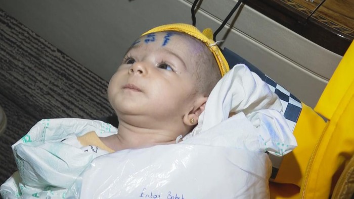 KAHRAMANMARAS, TURKIYE - FEBRUARY 08: Babies rescued from the rubble of collapsed buildings in Kahramanmaras are being transferred to Ankara by Turkish Presidential Plane after 7.7 and 7.6 magnitude earthquakes hit Turkiye's multiple provinces on February 8, 2023. 16 babies, left unaccompanied due to earthquake transferred to Ankara for care. Early Monday morning, a strong 7.7 earthquake, centered in the Pazarcik district, jolted Kahramanmaras and strongly shook several provinces, including Gaziantep, Kahramanmaras, Diyarbakir, Adana, Adiyaman, Malatya, Osmaniye, Hatay, and Kilis. Later, at 13.24 p.m. (1024GMT), a 7.6 magnitude quake centered in Kahramanmaras' Elbistan district struck the region. Turkiye declared 7 days of national mourning after deadly earthquakes in southern provinces. (Photo by Mehmet Ali Ozcan/Anadolu Agency via Getty Images)