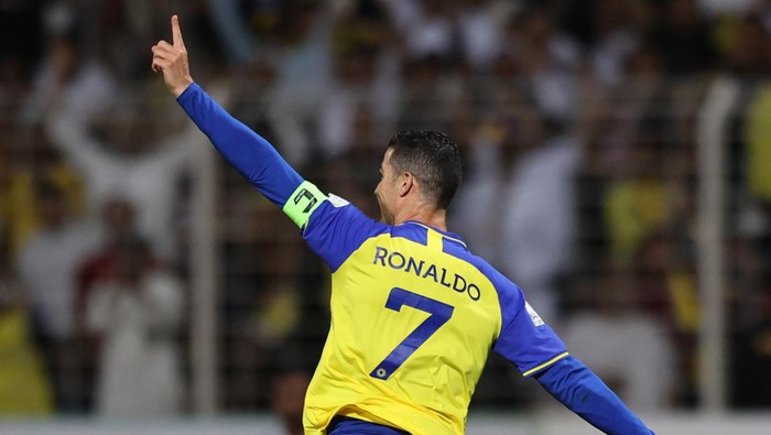 Nassrs Portuguese forward Cristiano Ronaldo celebrates scoring his teams fourth goal the Saudi Pro League football match between Al-Wehda and Al-Nassr at the King Abdulaziz Stadium in Mecca on February 9, 2023. (Photo by AFP) (Photo by -/AFP via Getty Images)