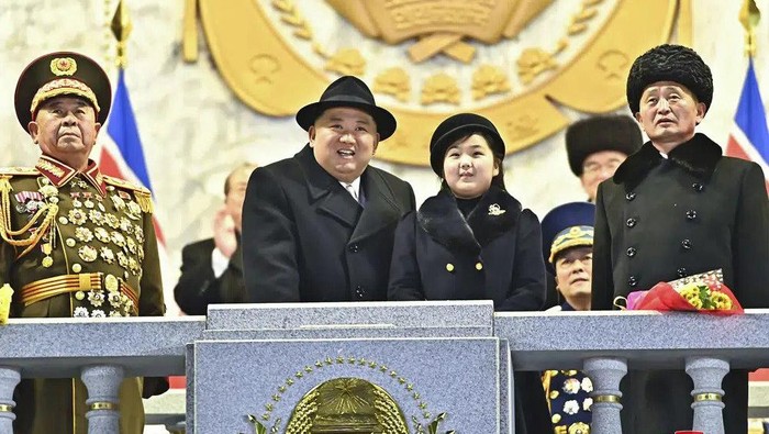 In this photo provided by the North Korean government, North Korean leader Kim Jong Un, center left, with his daughter attends a military parade to mark the 75th founding anniversary of the Korean People’s Army on Kim Il Sung Square in Pyongyang, North Korea Wednesday, Feb. 8, 2023. Independent journalists were not given access to cover the event depicted in this image distributed by the North Korean government. The content of this image is as provided and cannot be independently verified. Korean language watermark on image as provided by source reads: 
