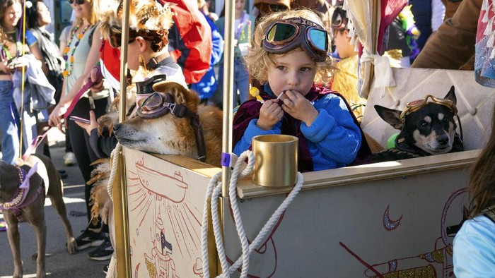 Participants take part in the Krewe of Barkus, Mardi Gras parade for dogs, in the French Quarter of New Orleans, Sunday, Feb. 12, 2023. (AP Photo/Rita Harper)