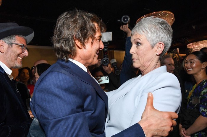 1247115817 Actors Tom Cruise (L) and Jamie Lee Curtis arrive at the 95th Annual Oscars Nominees Luncheon at The Beverly Hilton on February 13, 2023 in Beverly Hills, California. (Photo by VALERIE MACON / AFP) (Photo by VALERIE MACON/AFP via Getty Images)