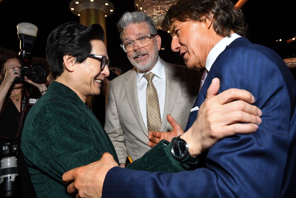 (L-R) Actor Ke Huy Quan, Filmmaker Christopher McqQarrien (C) and actor Tom Cruise arrive at the 95th Annual Oscars Nominees Luncheon at The Beverly Hilton on February 13, 2023 in Beverly Hills, California. (Photo by VALERIE MACON / AFP) (Photo by VALERIE MACON/AFP via Getty Images)