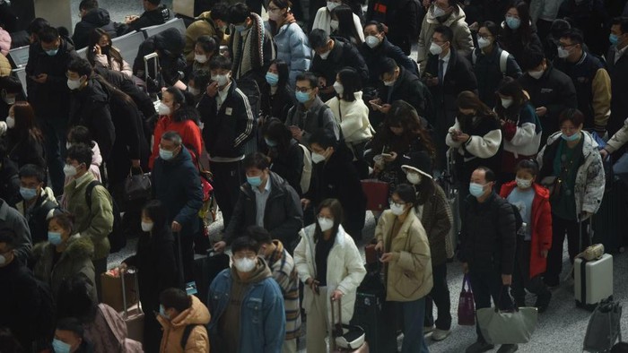 NANJING, CHINA - FEBRUARY 15, 2023 - Passengers exit Nanjing Railway Station in Nanjing, east China's Jiangsu province, Feb 15, 2023. The 40-day 2023 Spring Festival Travel rush comes to an end on Feb 15, 2023. During the 2023 Spring Festival travel rush, 2.095 billion trips are expected to be made, up 99.5% from the same period last year. (Photo credit should read CFOTO/Future Publishing via Getty Images)