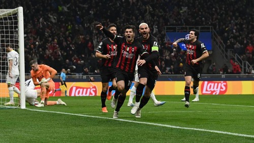 MILAN, ITALY - FEBRUARY 14:  Brahim Diaz of AC Milan celebrate with team-mates after scoring the opening goal during the UEFA Champions League round of 16 leg one match between AC Milan and Tottenham Hotspur at Giuseppe Meazza Stadium on February 14, 2023 in Milan, Italy. (Photo by Claudio Villa/AC Milan via Getty Images)