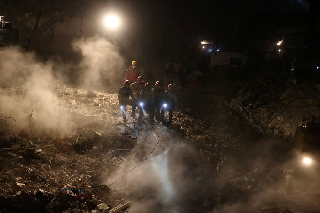Rescuers work on the rubble of a collapsed building in the aftermath of a deadly earthquake in Kahramanmaras, Turkey February 14, 2023. REUTERS/Alexandros Avramidis