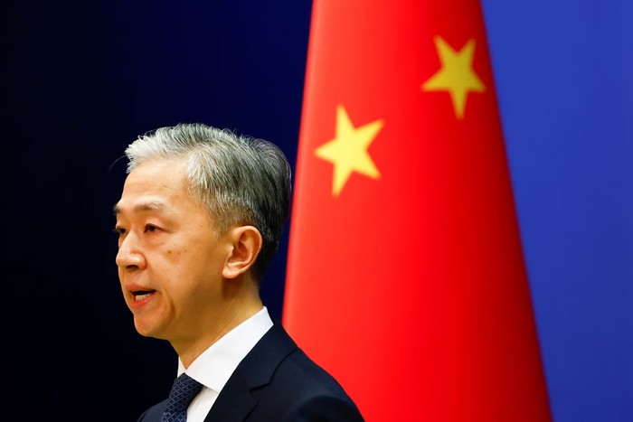 Chinese Foreign Ministry spokesperson Wang Wenbin speaks during a news conference in Beijing, China March 3, 2022. REUTERS/Carlos Garcia Rawlins