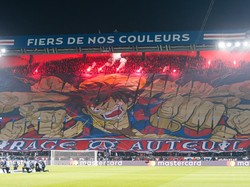 Gambar tersebut merupakan koreografi yang dilakukan fans Paris Saint-Germain untuk mengintimidasi lawan. (Foto: Getty Images/Eurasia Sport Images)