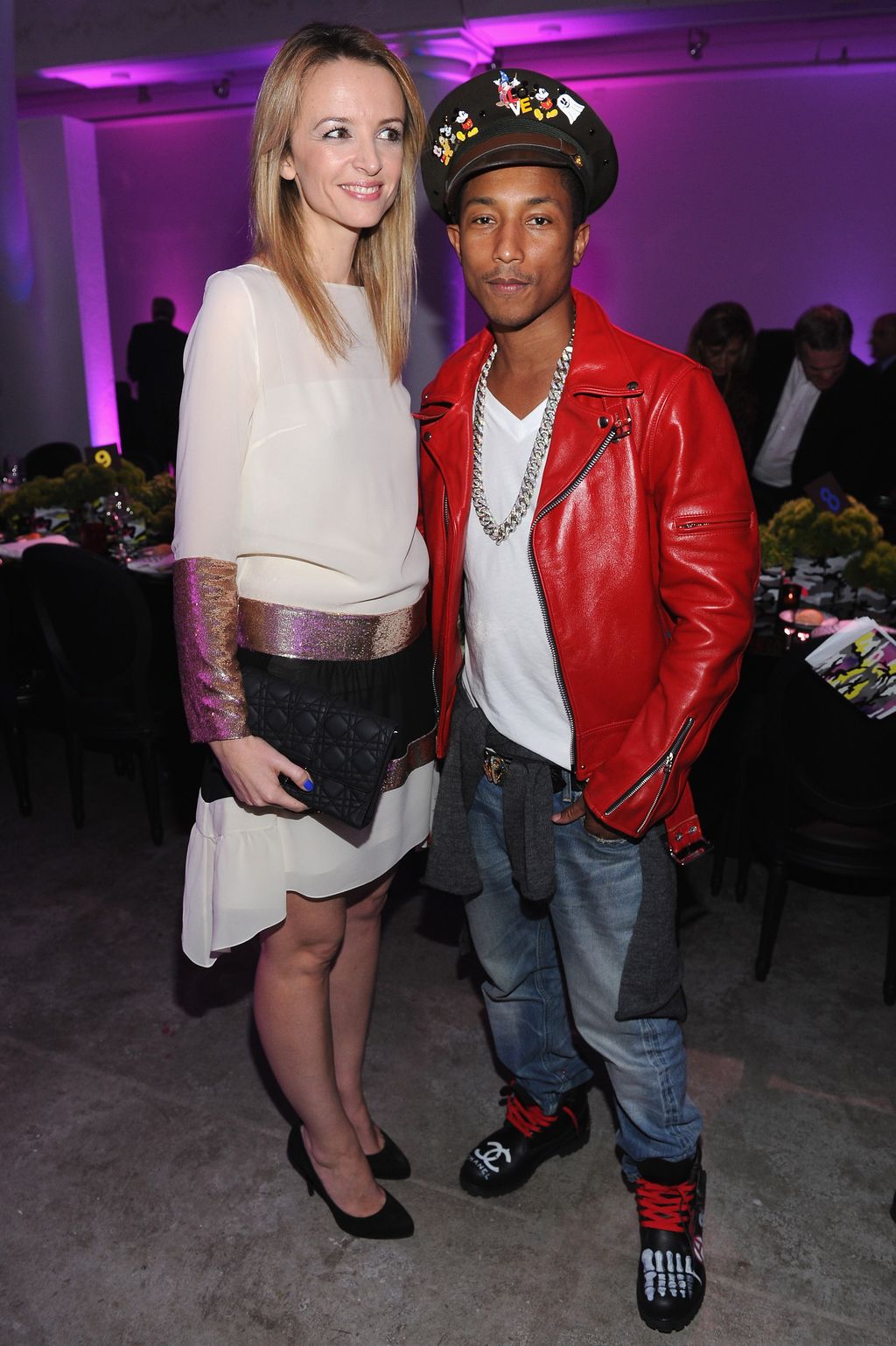 MIAMI, FL - NOVEMBER 29:  Delphine Arnault and musician Pharrell Williams attend the Dior pop-up shop featuring Anselm Reyle for Dior at Miami Design District on November 29, 2011 in Miami City.  (Photo by Dimitrios Kambouris/Getty Images for Dior)