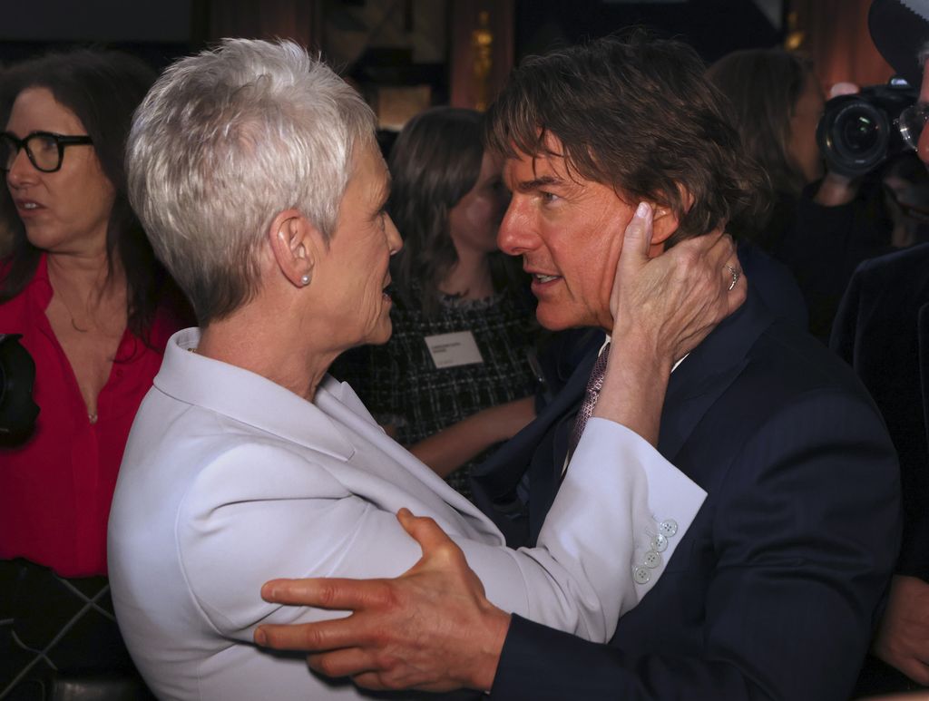 Jamie Lee Curtis, left, and Tom Cruise attend the 95th Academy Awards Nominees Luncheon on Monday, Feb. 13, 2023, at the Beverly Hilton Hotel in Beverly Hills, Calif. (Photo by Willy Sanjuan/Invision/AP)
