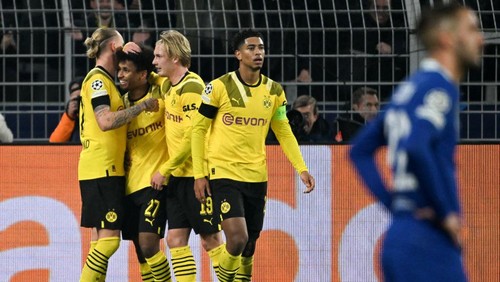 15 February 2023, North Rhine-Westphalia, Dortmund: Soccer: Champions League, Borussia Dortmund - Chelsea FC, knockout round, round of 16, first leg, Signal Iduna Park. Dortmunds Karim Adeyemi (2nd from left) celebrates his goal for 1:0 with the team. Photo: Federico Gambarini/dpa (Photo by Federico Gambarini/picture alliance via Getty Images)