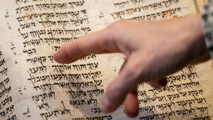 Sothebys unveils the Codex Sassoon for auction, Wednesday, Feb. 15, 2023, in the Manhattan borough of New York. The auction house is billing the lot as the earliest, most complete Hebrew Bible ever discovered. (AP Photo/John Minchillo)