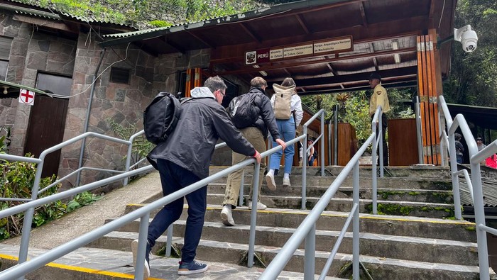 Tourists visit the ancient Inca ruins of Machu Picchu in the Urubamba valley, seventy-two kilometres from the Andes city of Cusco, on February 15, 2023, for the first time after they were closed to the public for security reasons on January 21, after protesters blocked the railways during protests against the government of President Dina Boluarte that have shaken the Andean country since December 7, 2022. (Photo by Carolina Paucar / AFP) (Photo by CAROLINA PAUCAR/AFP via Getty Images)
