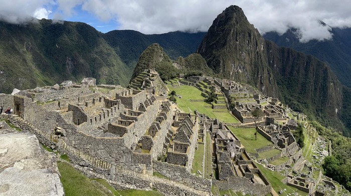 Tourists visit the ancient Inca ruins of Machu Picchu in the Urubamba valley, seventy-two kilometres from the Andes city of Cusco, on February 15, 2023, for the first time after they were closed to the public for security reasons on January 21, after protesters blocked the railways during protests against the government of President Dina Boluarte that have shaken the Andean country since December 7, 2022. (Photo by Carolina Paucar / AFP) (Photo by CAROLINA PAUCAR/AFP via Getty Images)