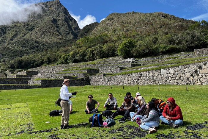 Tourists visit the ancient Inca ruins of Machu Picchu in the Urubamba valley, seventy-two kilometres from the Andes city of Cusco, on February 15, 2023, for the first time after they were closed to the public for security reasons on January 21, after protesters blocked the railways during protests against the government of President Dina Boluarte that have shaken the Andean country since December 7, 2022. (Photo by Carolina Paucar / AFP) (Photo by CAROLINA PAUCAR/AFP via Getty Images)