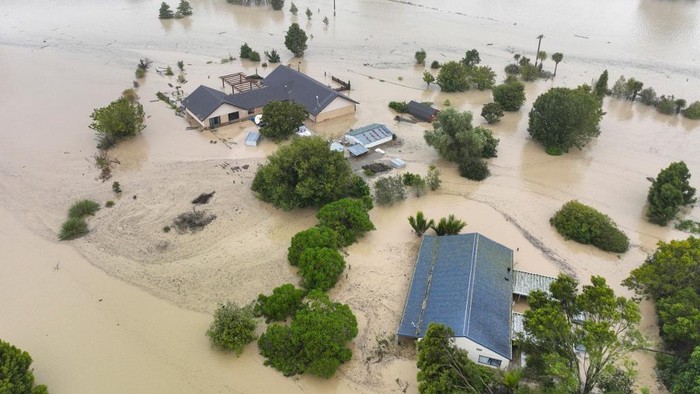 An aerial photo taken on February 14, 2023 shows flooding caused by Cyclone Gabrielle in Awatoto, near the city of Napier. - New Zealand declared a national state of emergency on February 14 as Cyclone Gabrielle swept away roads, inundated homes and left more than 100,000 people without power. (Photo by AFP) / New Zealand OUT