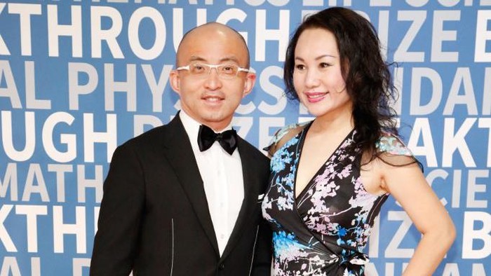 MOUNTAIN VIEW, CA - DECEMBER 03: China Renaissance CEO Fan Bao and Hui Yin Ching attend the 2018 Breakthrough Prize at NASA Ames Research Center on December 3, 2017 in Mountain View, California.   Kimberly White/Getty Images/AFP (Photo by Kimberly White / GETTY IMAGES NORTH AMERICA / Getty Images via AFP)