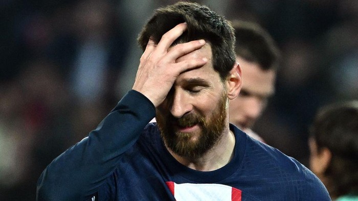 TOPSHOT - Paris Saint-Germains Argentine forward Lionel Messi reacts after missing a goal opportunity during the UEFA Champions League football match between Paris Saint-Germain (PSG) and Bayern Munich (FC Bayern Muenchen) at the Parc des Princes in Paris, on February 14, 2023. (Photo by Anne-Christine POUJOULAT / AFP) (Photo by ANNE-CHRISTINE POUJOULAT/AFP via Getty Images)