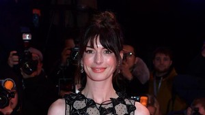 Anne Hathaway berperan sebagai Cat Woman, Selina Kyle, di The Dark Knight Rises (2012). Film trilogi yang digarap Christopher Nolan yang menampilkan Christian Bale sebagai Batman. Foto: WireImage/Dominique Charriau