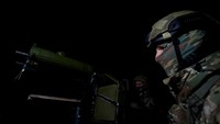 Anggota unit pertahanan teritorialnya, termasuk seorang pengacara dan seorang pengusaha, menanggapi peringatan serangan udara di dalam dan sekitar ibu kota Kyiv dengan berusaha menjatuhkan drone Shahed-136 buatan Iran dengan senapan mesin Perang Dunia Kedua yang telah direstorasi. 