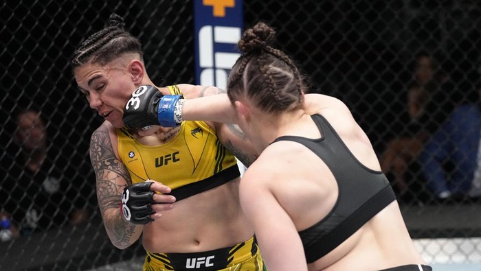 LAS VEGAS, NEVADA - FEBRUARY 18: (R-L) Erin Blanchfield punches Jessica Andrade of Brazil in a flyweight fight during the UFC Fight Night event at UFC APEX on February 18, 2023 in Las Vegas, Nevada. (Photo by Jeff Bottari/Zuffa LLC via Getty Images)