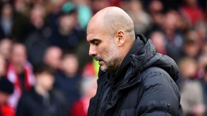 NOTTINGHAM, ENGLAND - FEBRUARY 18: Pep Guardiola, Manager of Manchester City looks despondent before the Premier League match between Nottingham Forest and Manchester City at City Ground on February 18, 2023 in Nottingham, England. (Photo by Richard Sellers/Getty Images)